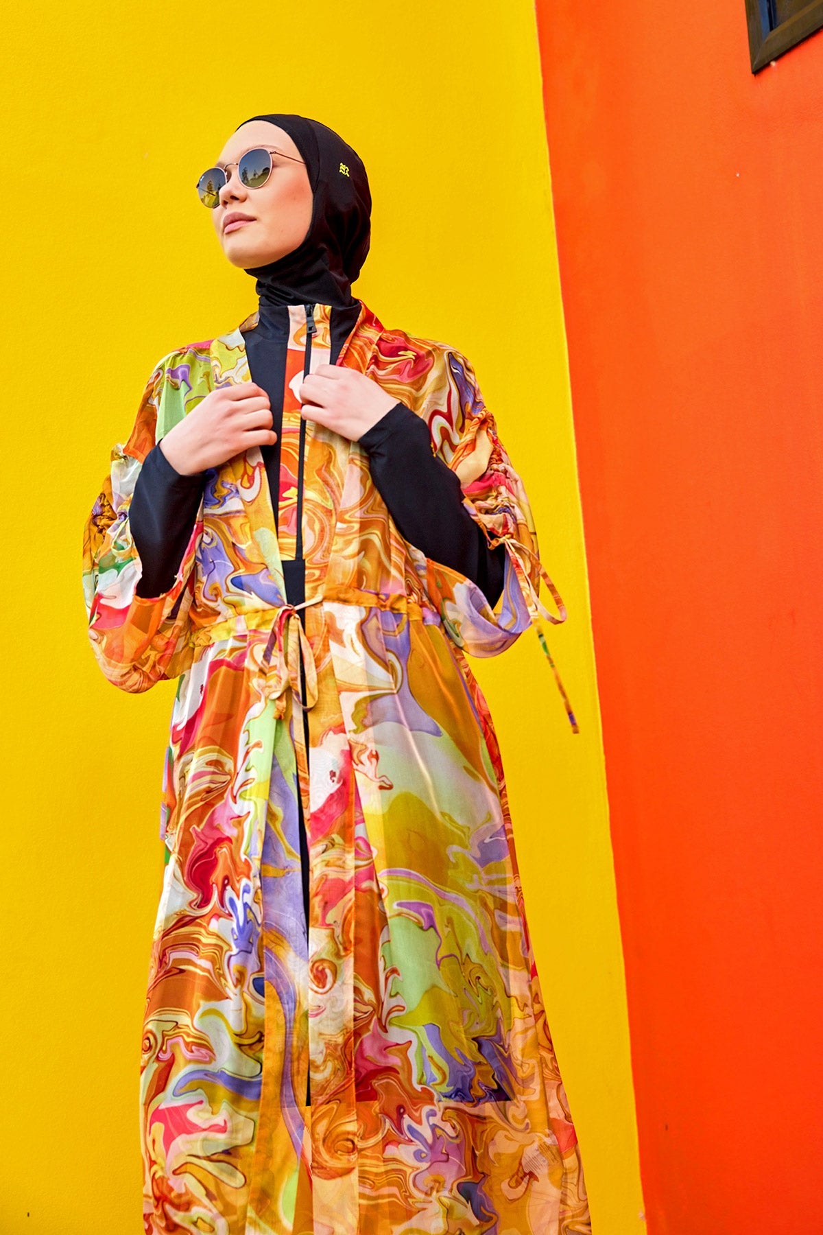 Silky Modest full coverage kimono pareo by Marina Modest, lightweight and elegant beach cover-up, shown draped on a stand.