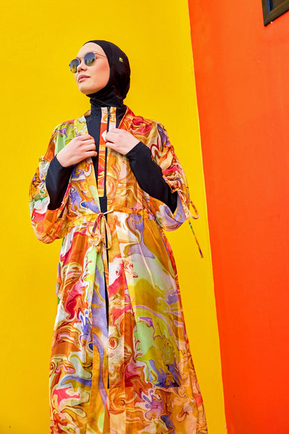 Silky Modest full coverage kimono pareo by Marina Modest, lightweight and elegant beach cover-up, shown draped on a stand.