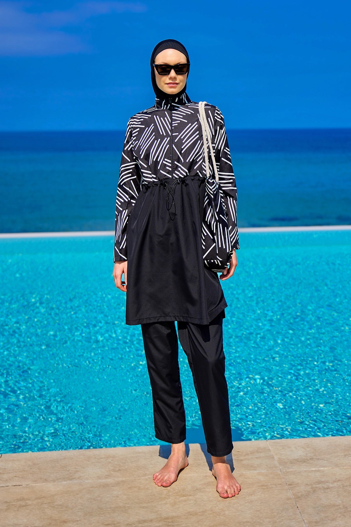Black full coverage modest swimwear set for women by Marina Modest, featuring a tam kapalı mayo style for comfortable sun protection.