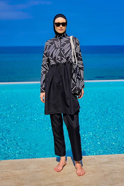 Black full coverage modest swimwear set for women by Marina Modest, featuring a tam kapalı mayo style for comfortable sun protection.