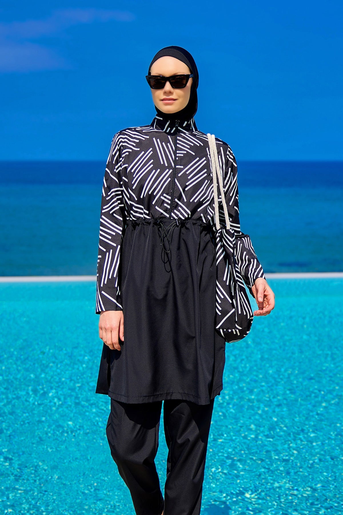 Black full coverage modest swimwear set for women, Marina Modest Tam Kapalı Mayo, with long sleeves and full-coverage design.