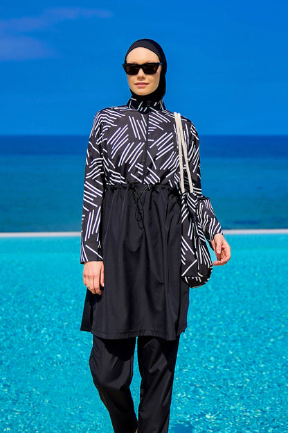 Black full coverage modest swimwear set for women, Marina Modest Tam Kapalı Mayo, with long sleeves and full-coverage design.