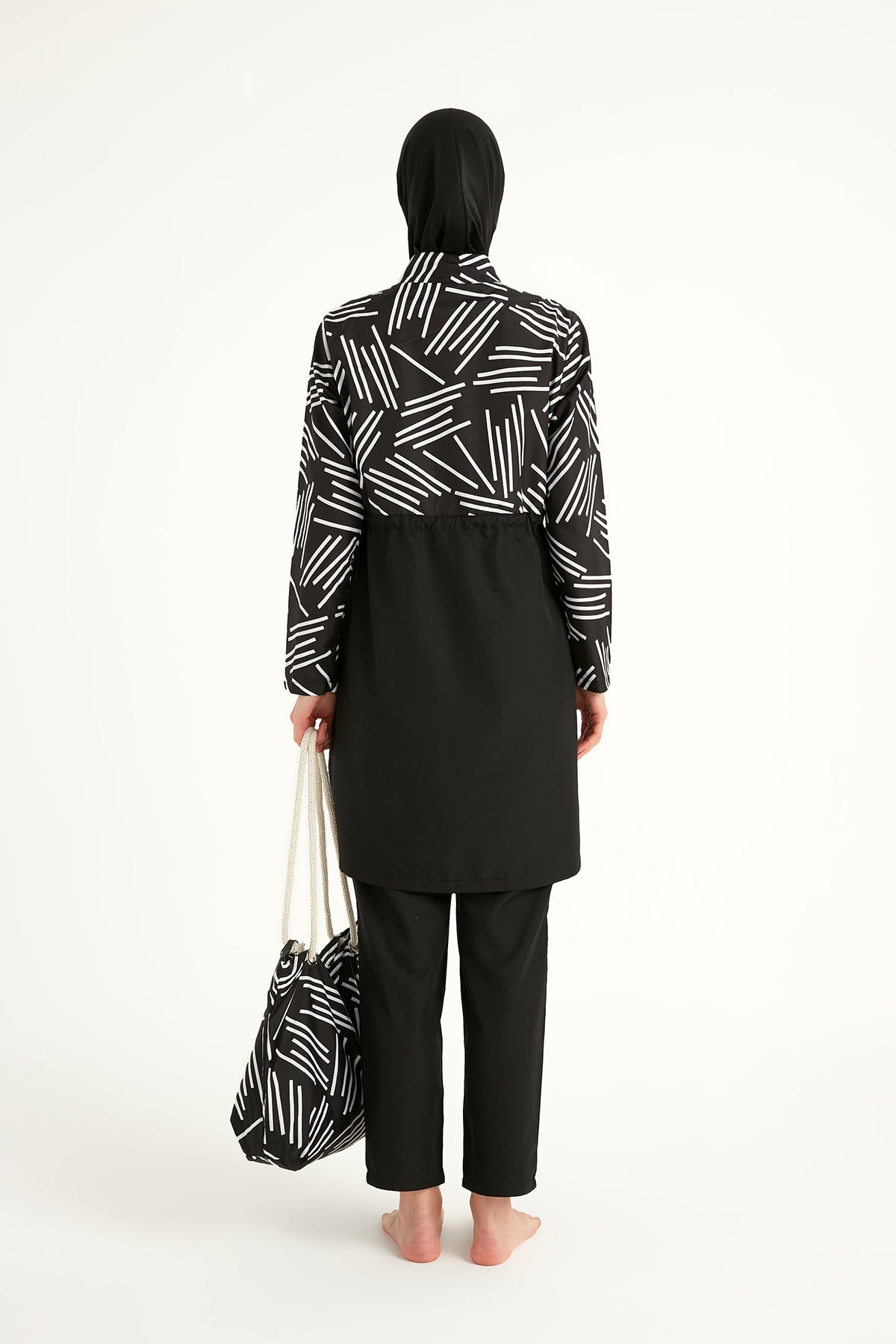 Black full coverage modest swimwear set for women by Marina Modest, featuring a tam kapalı mayo style for modest swimwear.