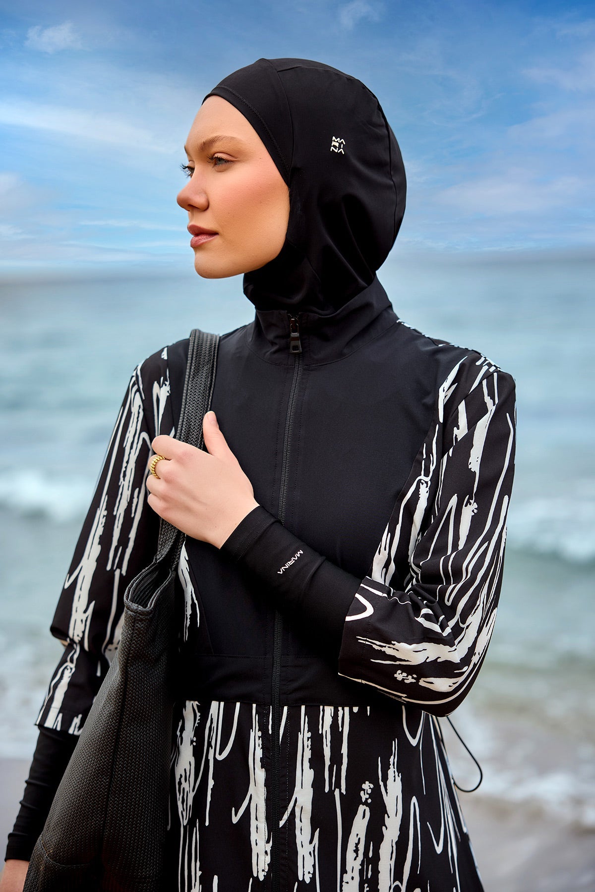 Black full coverage swimwear burkini set by Marina Modest, featuring modest, full-body design for comfortable swimming.