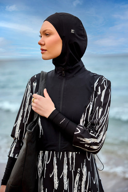 Black full coverage swimwear burkini set by Marina Modest, featuring modest, full-body design for comfortable swimming.