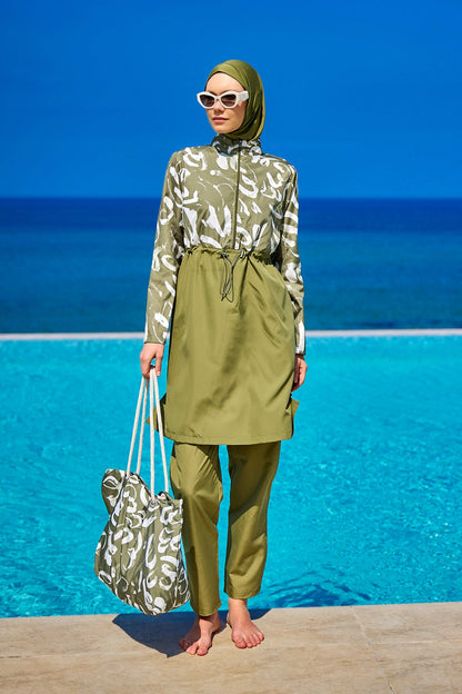 Green full coverage modest swimwear set for women, Tam Kapalı Mayo by Marina Modest, designed for comfortable, stylish swimming.