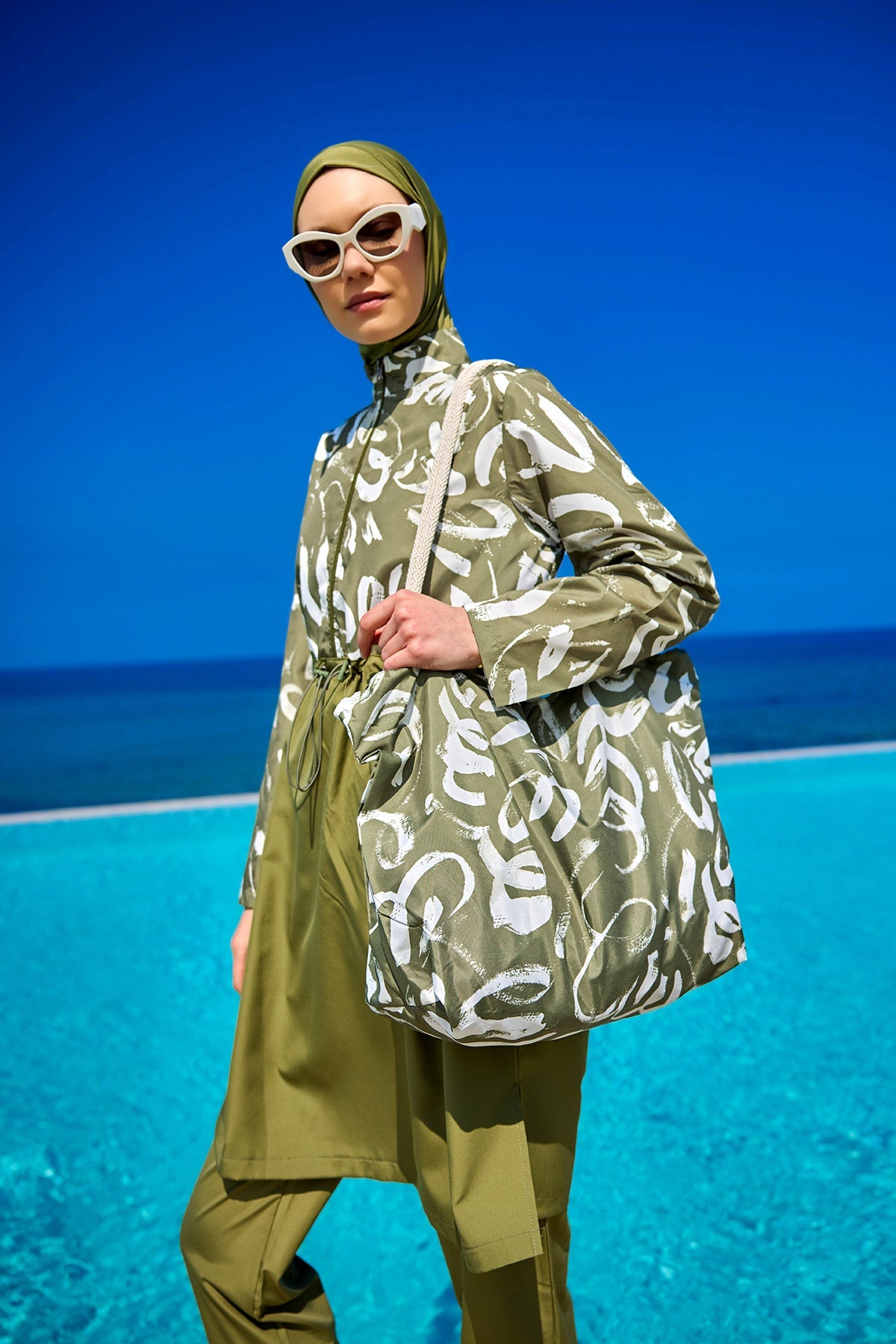 Green full coverage modest swimwear set for women by Marina Modest, featuring a tam kapalı mayo style for comfortable swim.