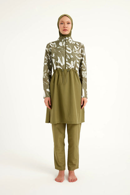Green full coverage modest swimwear set for women by Marina Modest, featuring a tam kapalı mayo style.