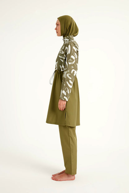 Green full coverage modest swimwear set for women by Marina Modest, featuring a tam kapalı mayo design.