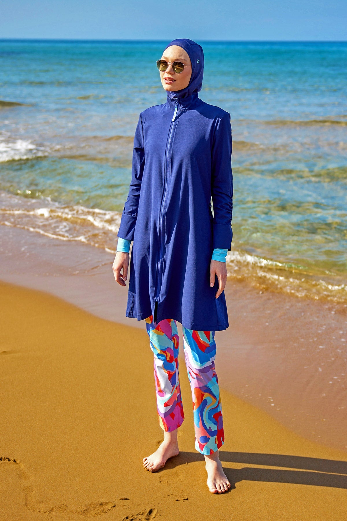 Marina Modest full coverage Tam Kapalı Mayo swimsuit in black with long sleeves and modest design for swimming.