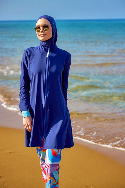 Marina Modest full coverage tam kapalı mayo swimsuit in black with long sleeves and high neck design.