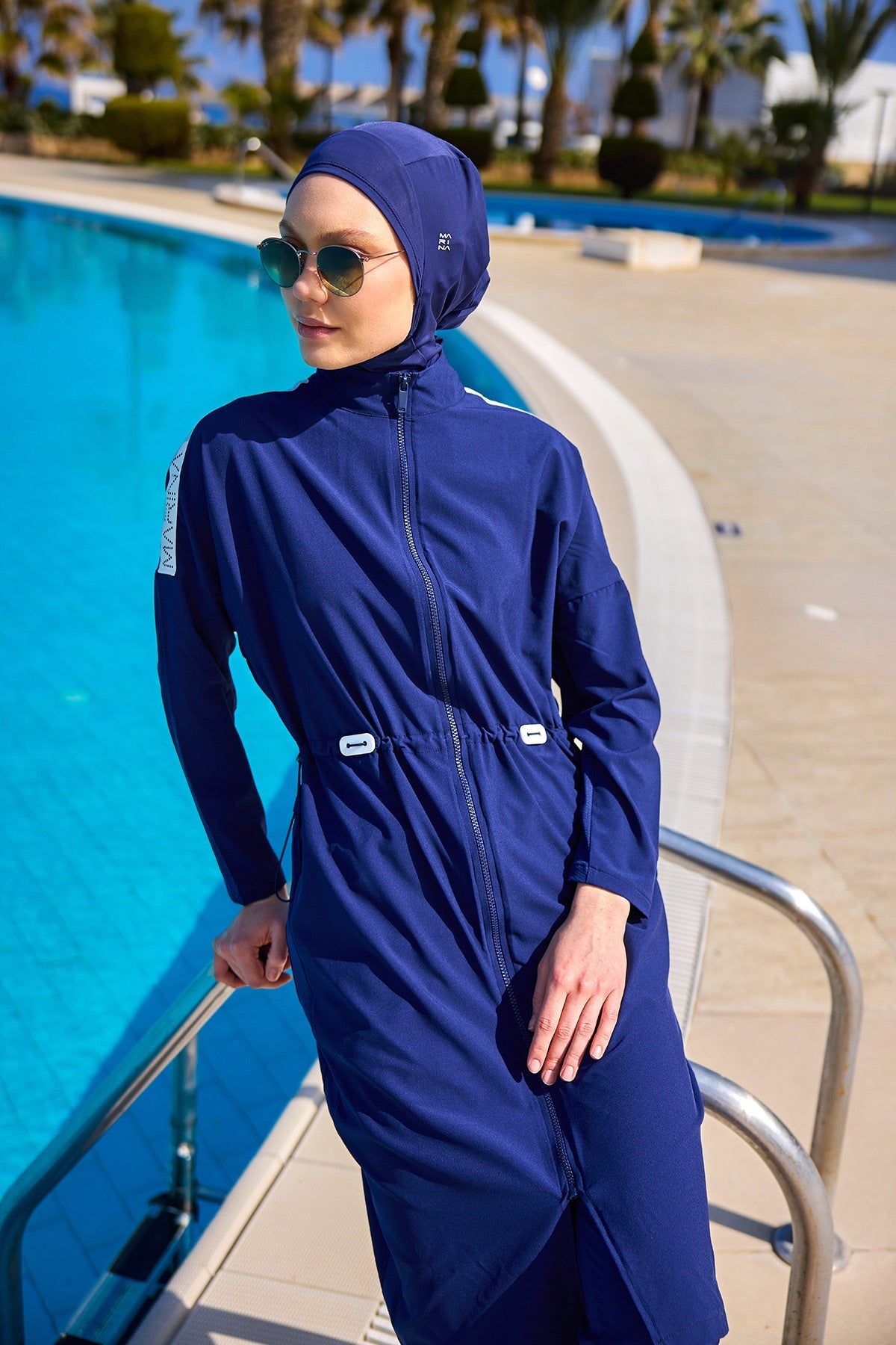 Navy full coverage modest swimwear burkini set by Marina Modest, includes long sleeves and full-body design for sun protection.