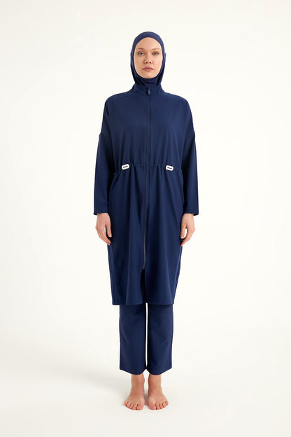 Navy full coverage modest swimwear burkini set by Marina Modest, designed for comfortable, full-body sun protection at the beach.