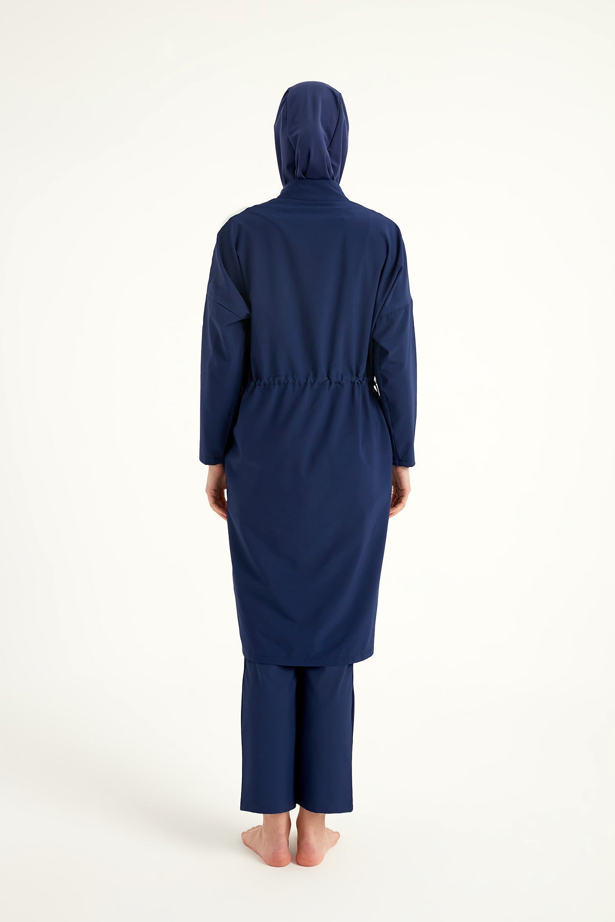 Navy full coverage modest swimwear burkini set by Marina Modest, featuring a long-sleeve top and matching full-coverage bottoms.