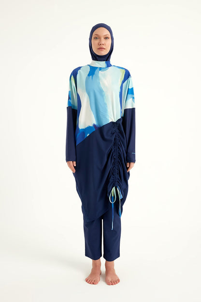 Navy full coverage modest swimwear burkini set by Marina Modest, featuring long sleeves and full-body design for sun protection.