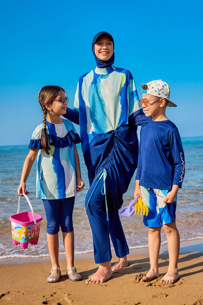 Navy full coverage modest swimwear burkini set by Marina Modest, featuring a tam kapalı mayo design with long sleeves and full-body coverage.