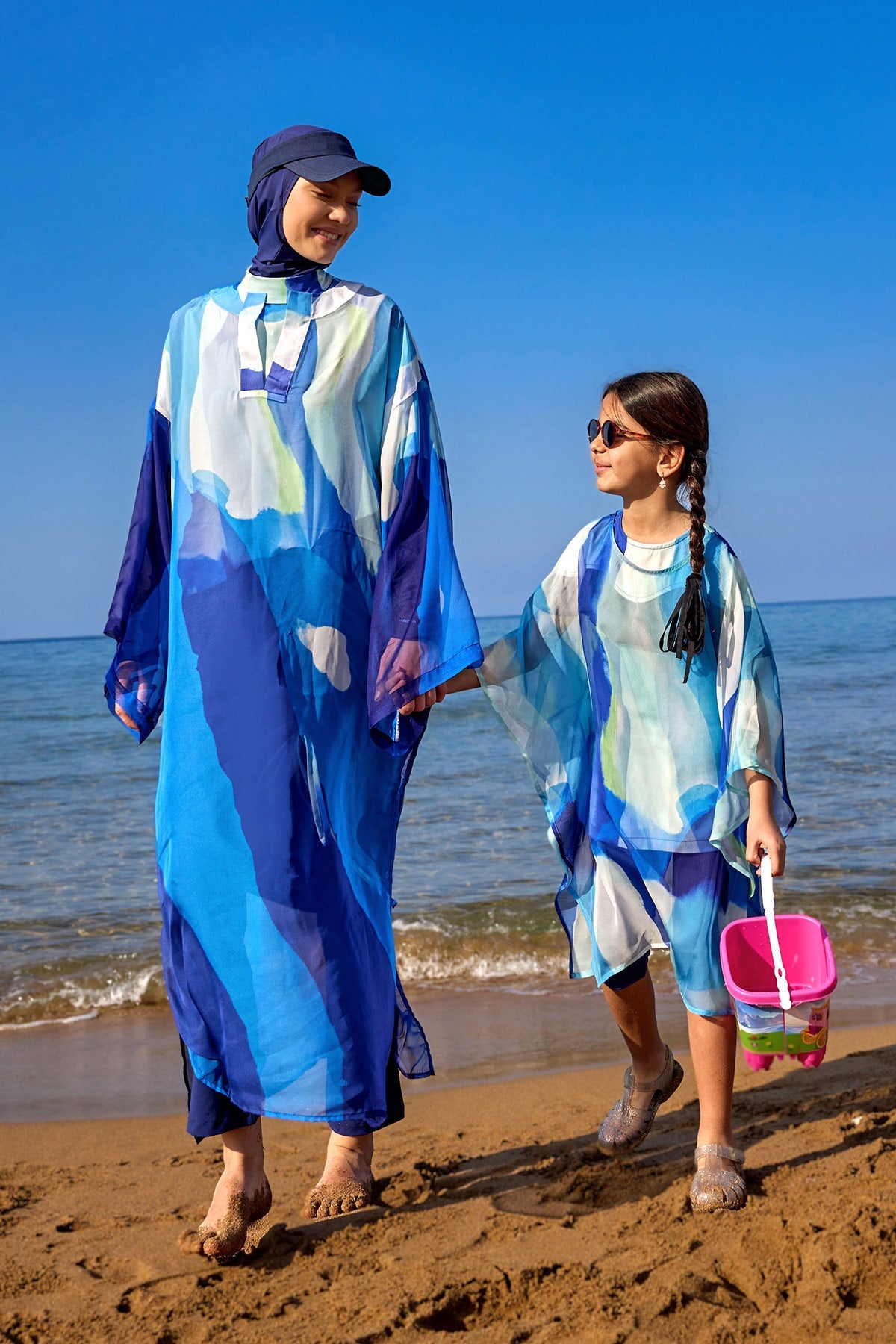 Navy full coverage modest swimwear burkini set by Marina Modest, featuring long sleeves and full-body coverage for women.