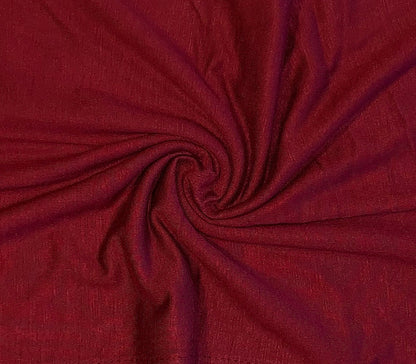 Maroon cotton jersey hijab from Muslimah.de displayed flat, showcasing its soft fabric and rectangular shape.