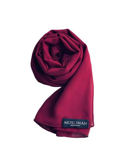 Maroon premium chiffon hijab from Muslimah.de, lightweight and elegant fabric, draped over a neutral background.