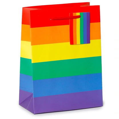 Medium rainbow gift bag by Proud Supplies featuring colorful rainbow design and sturdy handles for gift presentation.