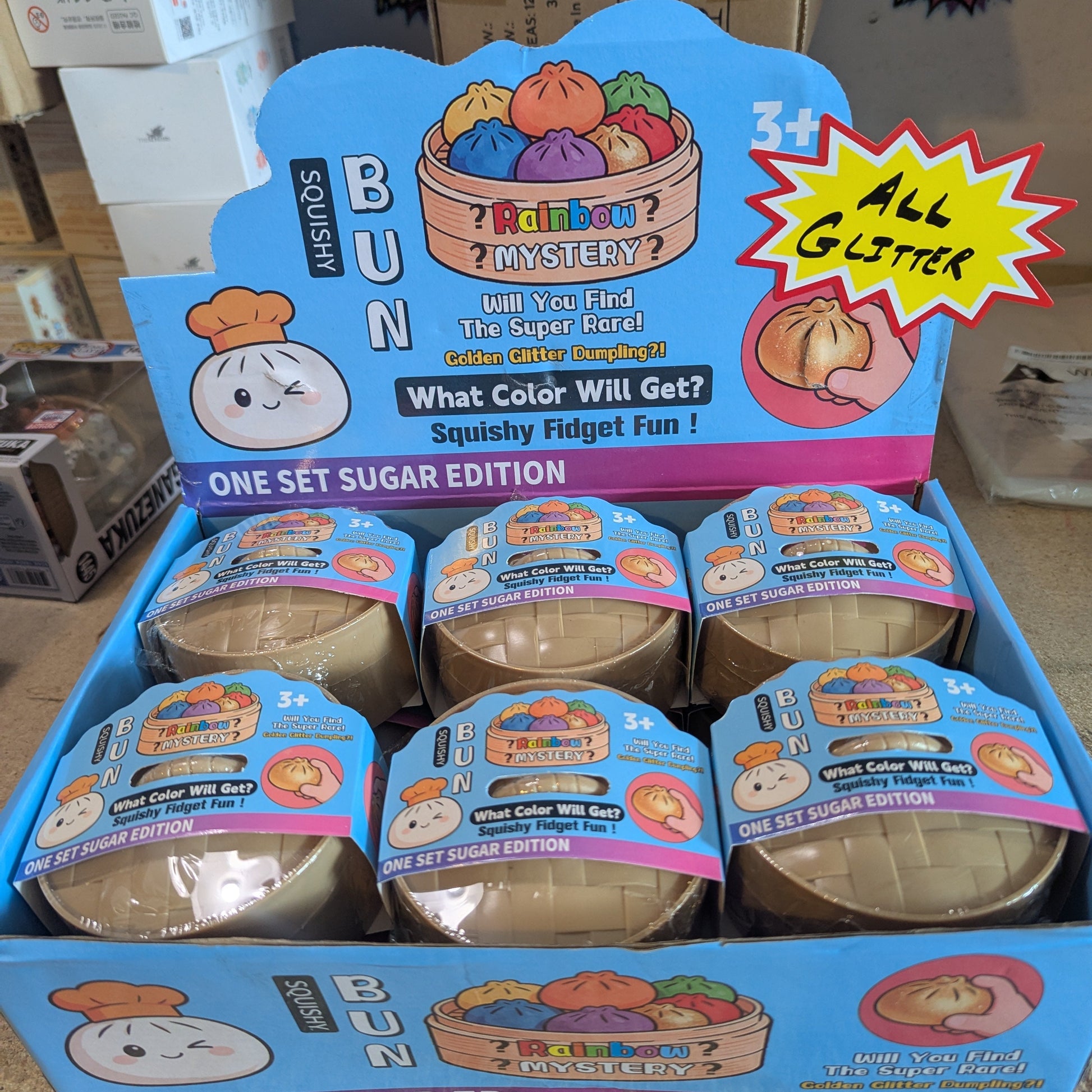 Colorful glittery squishy bun mystery dumplings toy from Ralphie's Funhouse, soft and squeezable for stress relief.