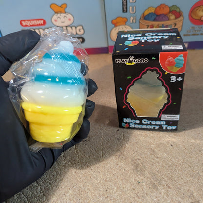 Blue and white swirl ice cream cone squishy from Ralphie's Funhouse, soft gelatin squish with realistic ice cream cone details.
