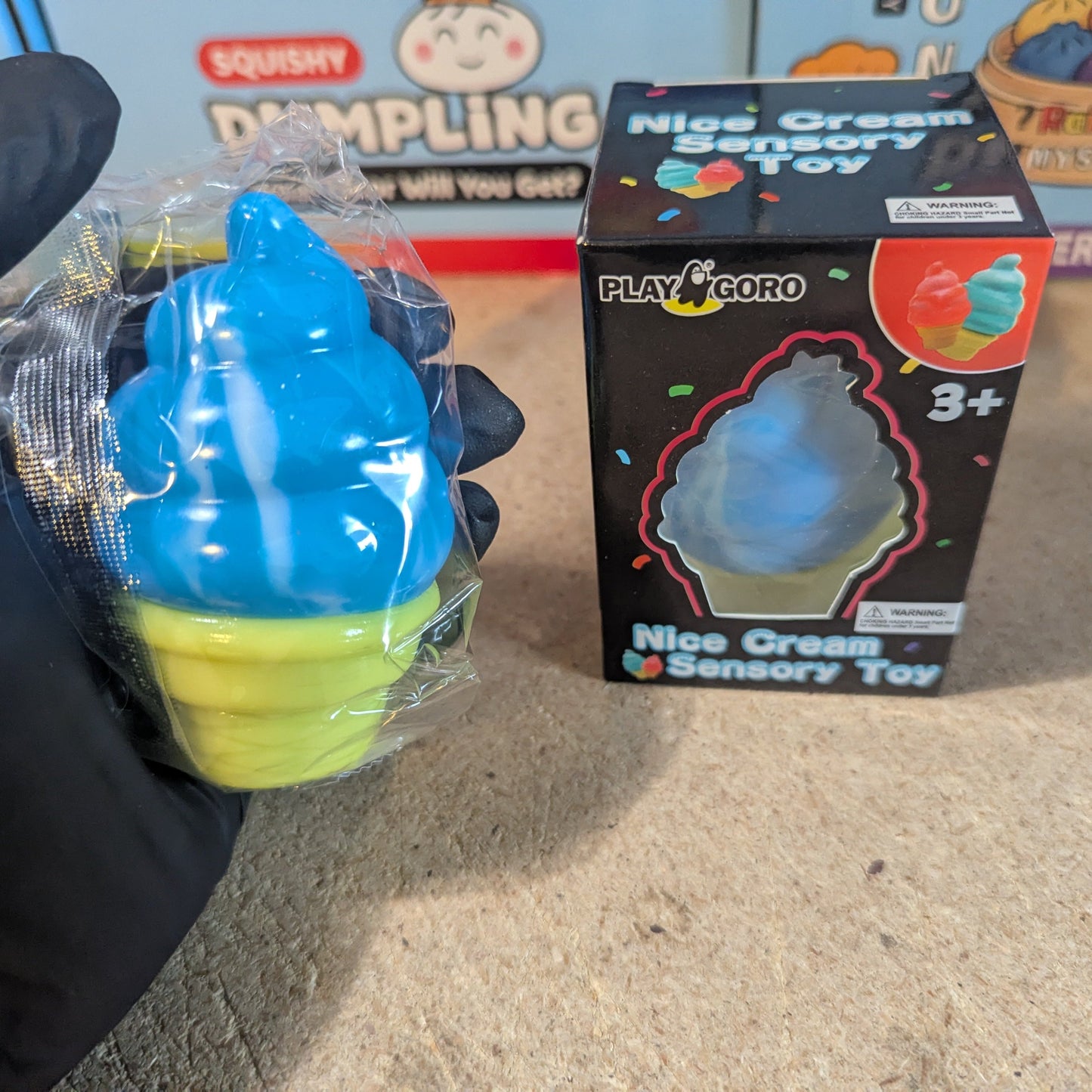 Blue creamy ice cream cone squishy from Ralphie's Funhouse, slow rising soft stress relief toy with realistic cone details.