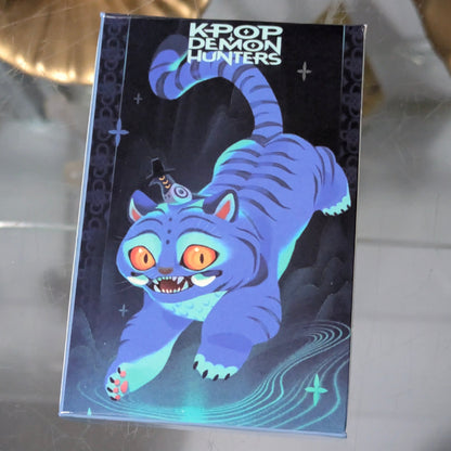 K-POP DEMON HUNTERS collectible card set by Ralphie's Funhouse, Derpy Tiger Edition with 55 colorful cards featuring characters.