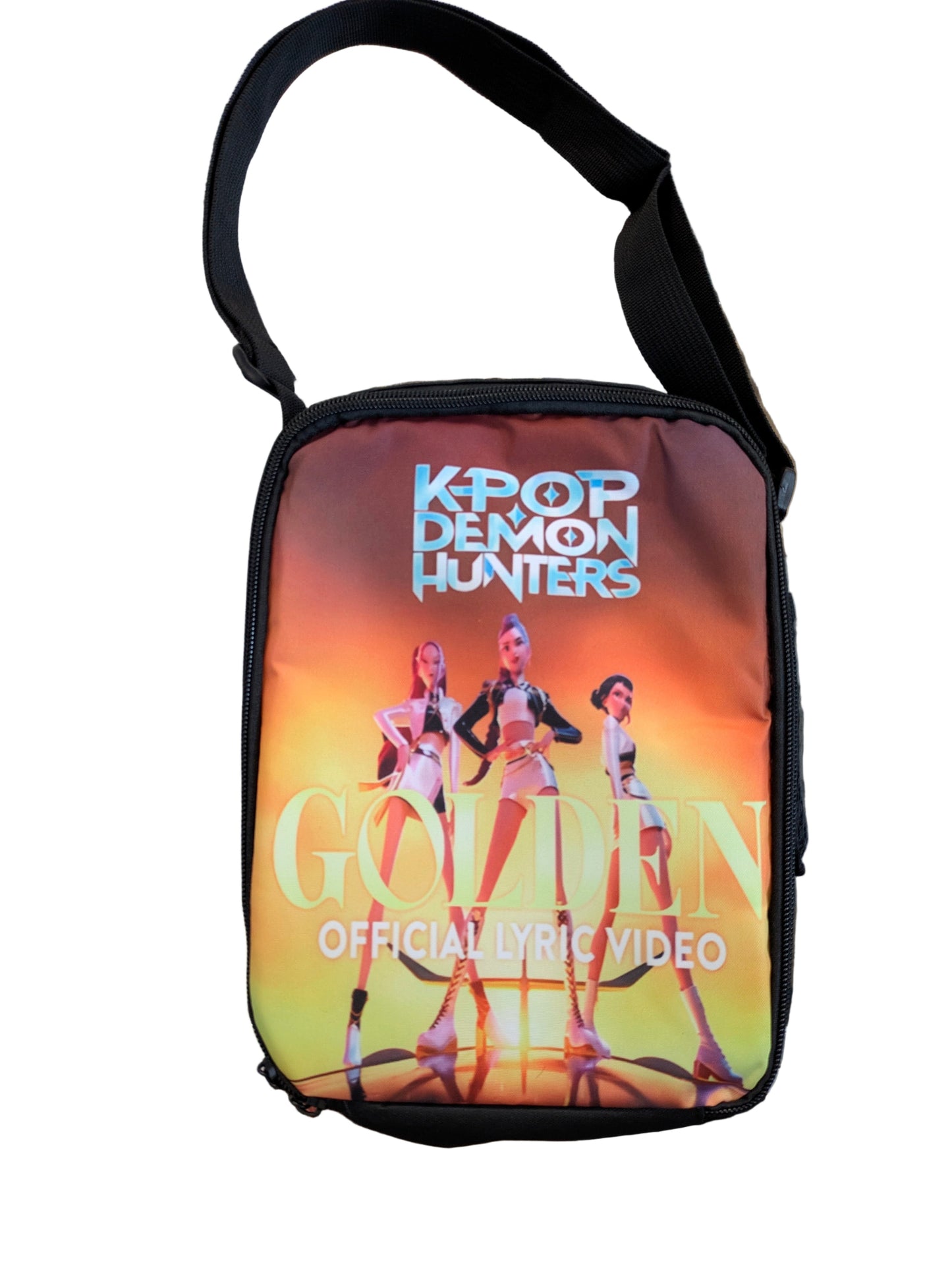 K-POP DEMON HUNTERS shoulder lunch bag in golden edition by Ralphie's Funhouse, featuring character artwork and a compact design.