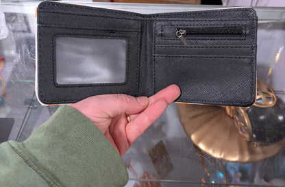 K-POP DEMON HUNTERS wallet featuring chibi-style characters, vibrant colors, and compact design from Ralphie's Funhouse.