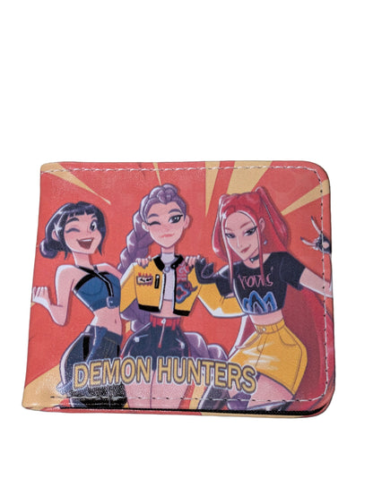 K-POP DEMON HUNTERS Wallet by Ralphie's Funhouse featuring a vibrant trio burst design on a sleek wallet.