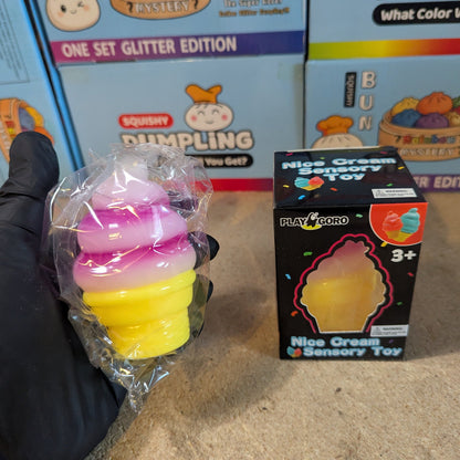 Magenta and white swirl ice cream cone squishy from Ralphie's Funhouse, soft gelatin texture, realistic dessert design.