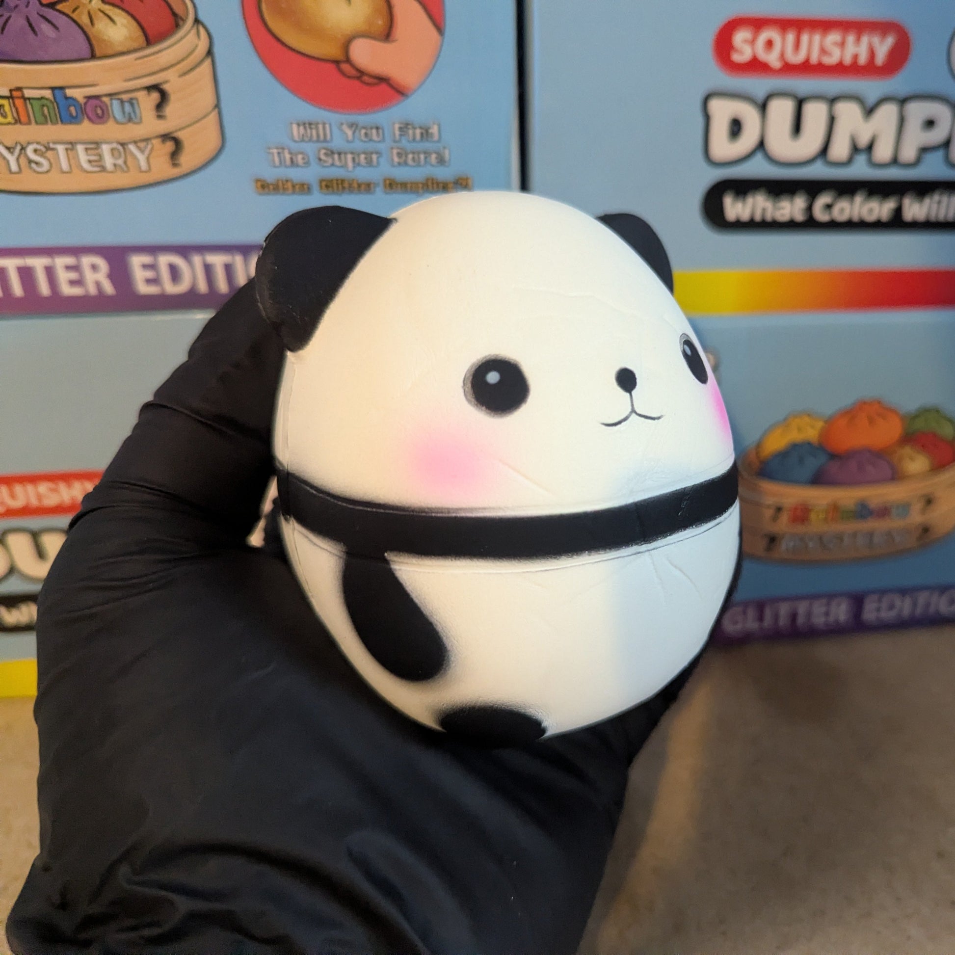 Soft pink and white Perfect Panda squishy toy from Ralphie's Funhouse with slow foam squish for stress relief.