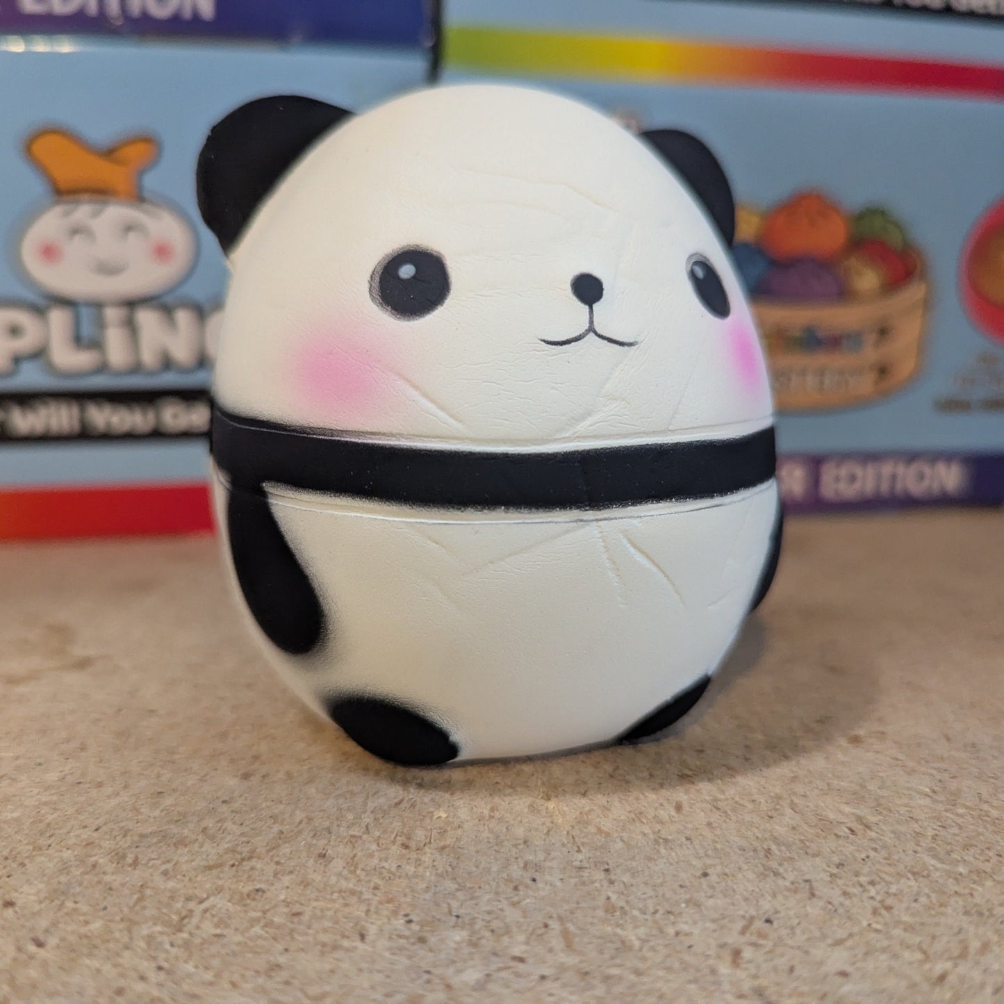 Soft, slow-foam Perfect Panda Squishy by Ralphie's Funhouse shown in a close-up of the squishy panda's face and plush body.