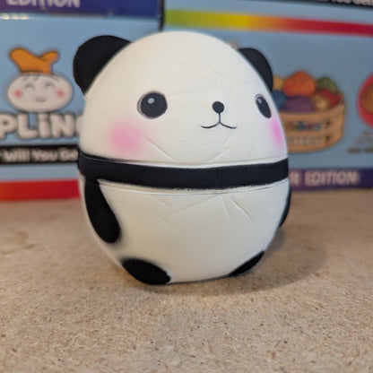 Soft, slow-foam Perfect Panda Squishy by Ralphie's Funhouse shown in a close-up of the squishy panda's face and plush body.