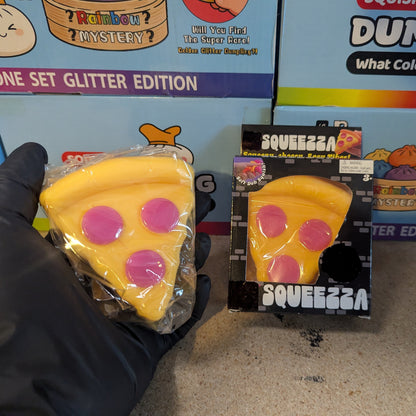 Ralphie's Funhouse Pizza Wannabe Squeezza Squish gelatin squish toy showing a colorful, squishy pizza-shaped figure in bright colors.