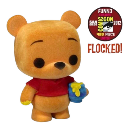 Flocked Winnie the Pooh Pop! Disney figure, SDCC limited edition #32, graded PSA 7.0, encased in protective capsule.
