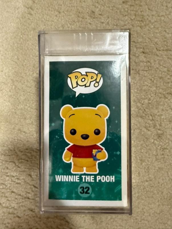 Flocked Winnie the Pooh Pop! Disney collectible figure in PSA 7.0 graded and encased, featuring classic Disney character.