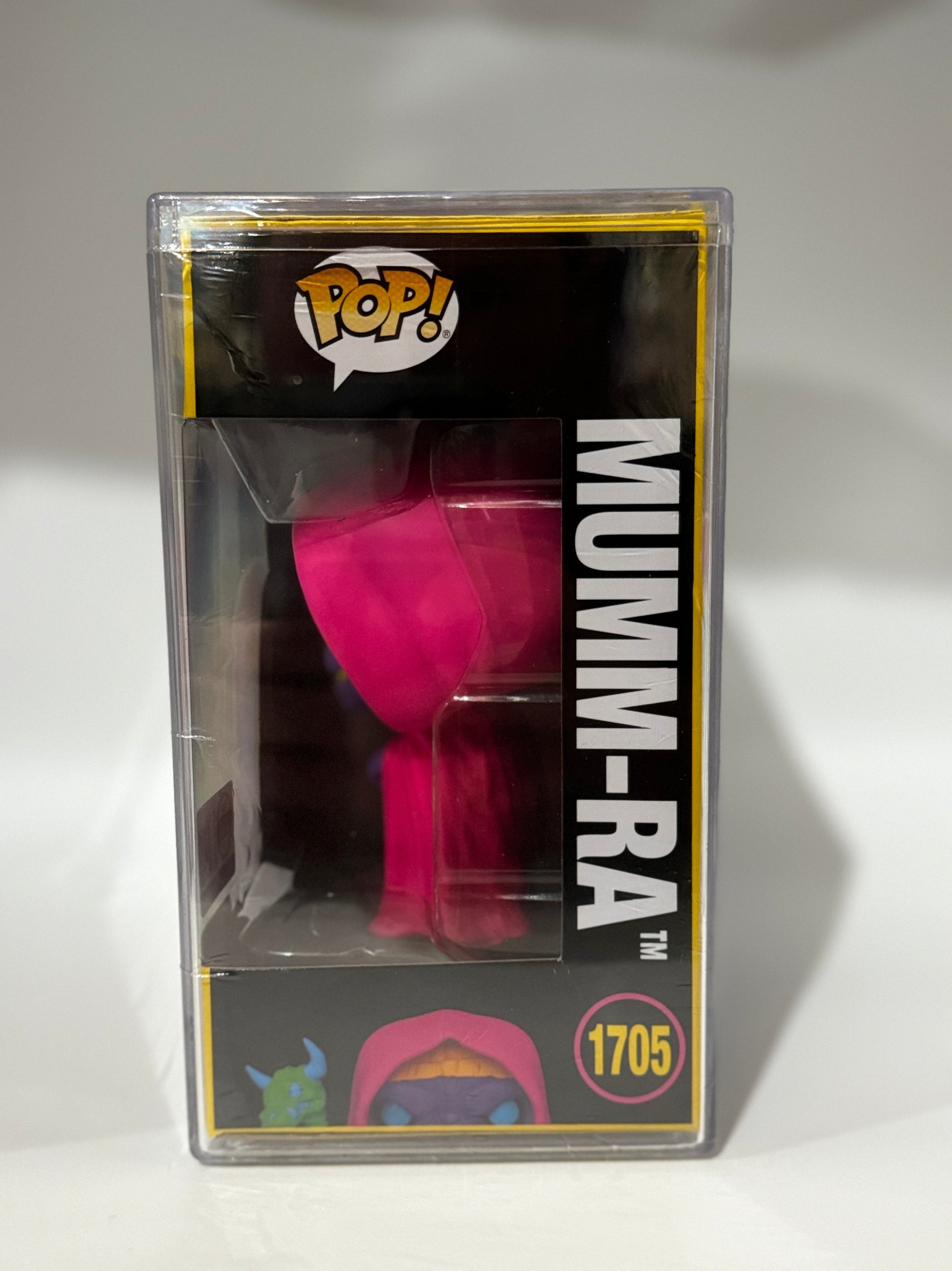 Funko Pop! ThunderCats Mumm-Ra Blacklight figure from Ralphie's Funhouse, decayed form collectible with vibrant blacklight details.