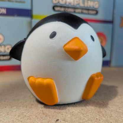 Ralphie's Funhouse Puffy Penguin Squishy with slow foam texture, soft and squeezable toy resembling a cute penguin.
