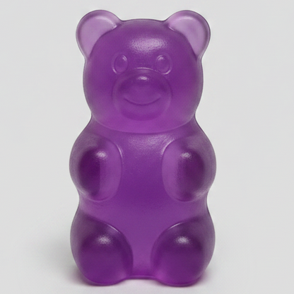Purple Gummy Bear Squish toy from Ralphie's Funhouse, a slow-rising stress-relief squishy with a soft, textured gummy bear appearance.