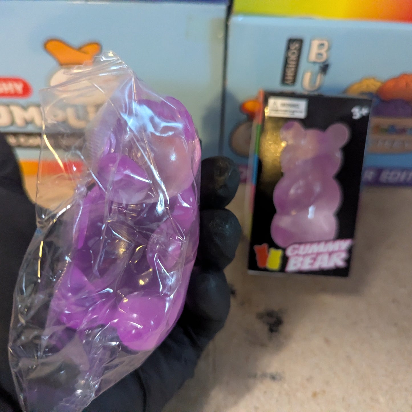 Purple Gummy Bear Squish toy from Ralphie's Funhouse, slow-rising squishy with a soft, textured gummy bear design.