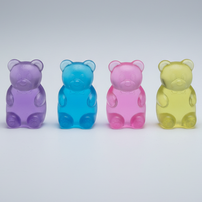 Set of four slow-rising Gummy Bear Squish toys from Ralphie's Funhouse, colorful and soft with smiling bear faces.