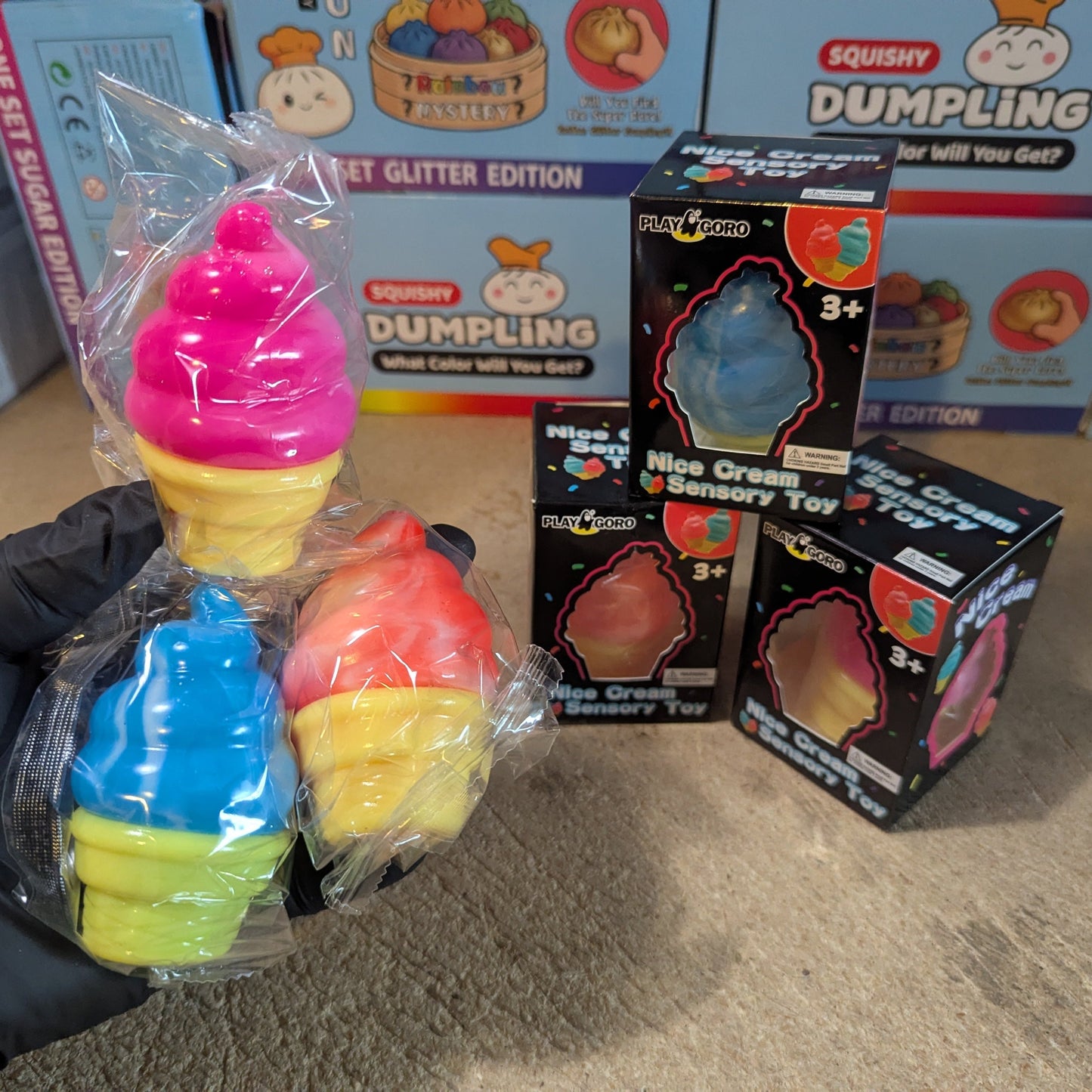 Set of three creamy ice cream cone squishies from Ralphie's Funhouse, slow rising and soft for stress relief and sensory play.