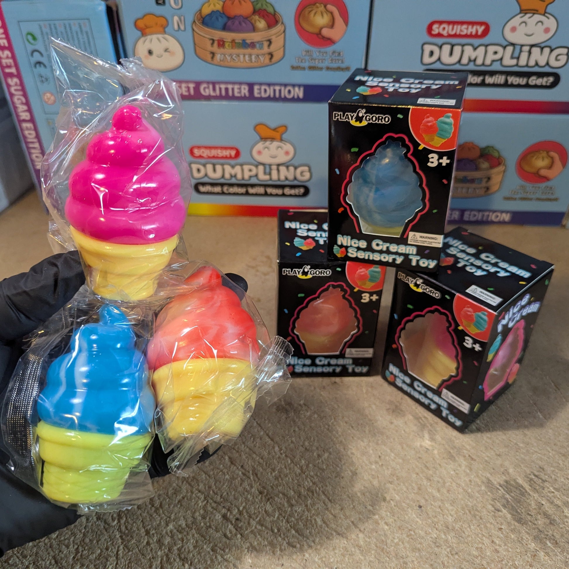 Set of three creamy ice cream cone squishies from Ralphie's Funhouse, slow rising and soft for stress relief and sensory play.
