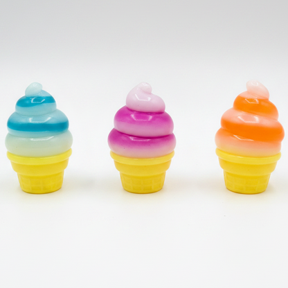 Set of three swirl ice cream cone squishies by Ralphie's Funhouse, soft gelatin squish toys in colorful cone shapes.