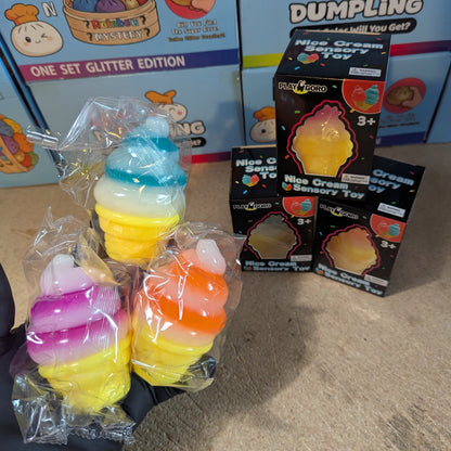 Set of three swirl ice cream cone squishies by Ralphie's Funhouse, soft gelatin stress toys with colorful swirl designs.