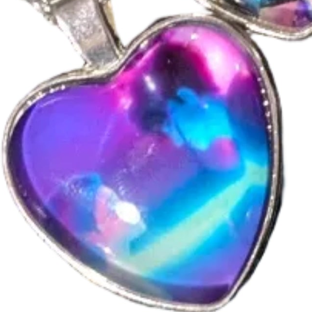 K-POP Demon Hunters Heart Pendant Necklace featuring character art from Ralphie's Funhouse, with detailed design and vibrant colors.