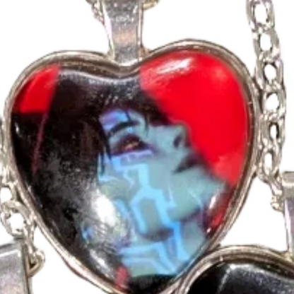K-POP Demon Hunters Heart Pendant Necklace featuring character art from Ralphie's Funhouse collection, showcasing Jinu and Rumi design.