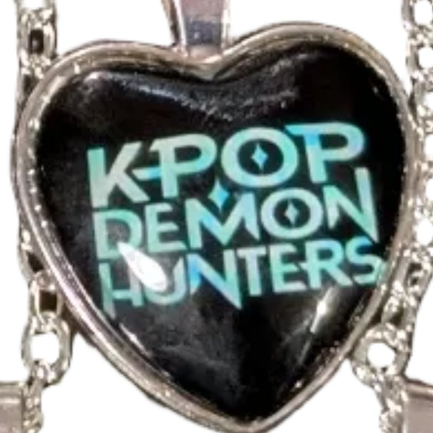 K-POP Demon Hunters Heart Pendant Necklace featuring character art of Jinu and Rumi from Ralphie's Funhouse collection.